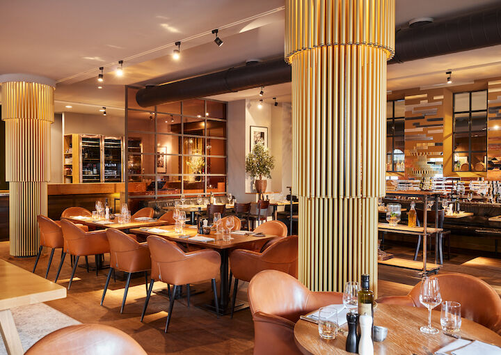 Mangold interior with wood, leather and touches of gold detail