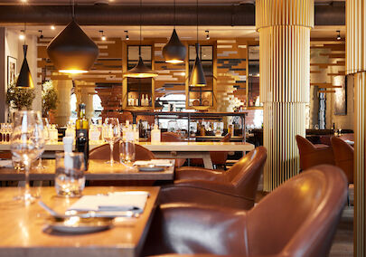 Gemütliches Interior im Mangold Restaurant des Gastwerk Hotels