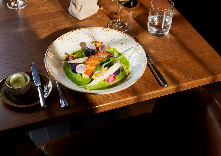 Pan-seared salmon with local vegetables at Mangold restaurant
